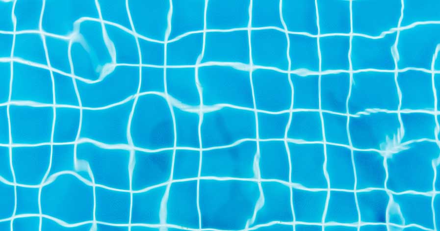 Water in a pool with tiled bottom