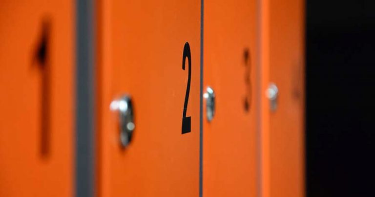 Orange lockers with numbers on them