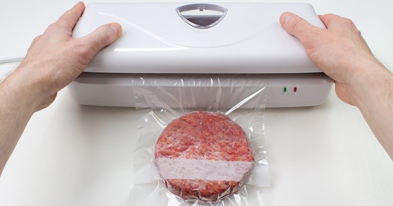 Hamburger being vacuum sealed